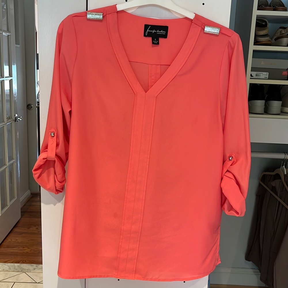 NWOT coral blouse with silver shoulder accents. Long sleeve to 4/4 button